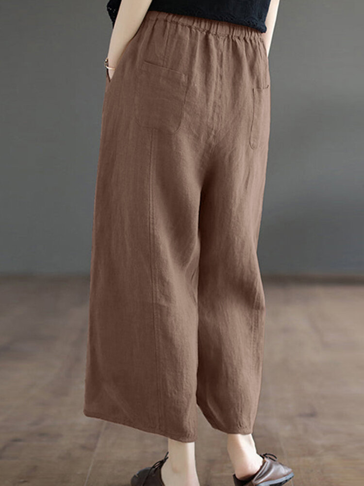 Solid Asymmetrical Hem Pocket Wide Leg Crop Pants